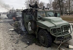view shows destroyed Russian Army all-terrain infantry mobility vehicles Tigr-M (Tiger) on a road in Kharkiv, Ukraine,