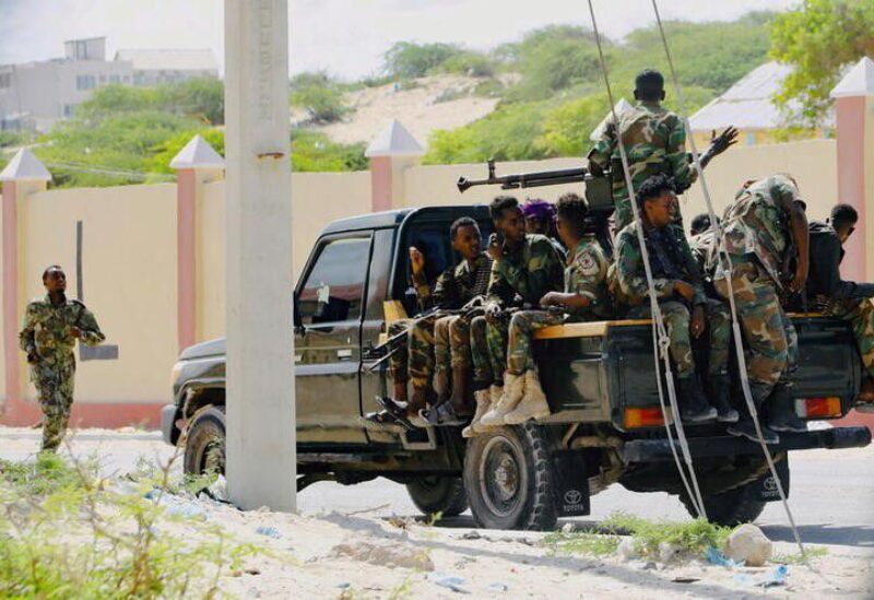 Somali military soldiers loyal to Prime Minister Mohamed Hussein Roble take positions outside the Aden Adde International Airport where members of the Lower House of Parliament are meeting to elect a speaker, in Mogadishu, Somalia, April 27, 2022. REUTERS/Feisal Omar