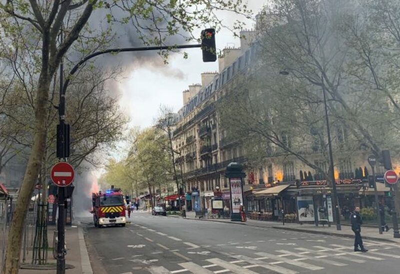 Fire from burning bus in Paris - REUTERS