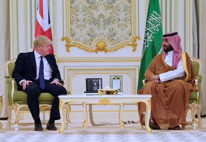 British Prime Minister Boris Johnson speaks with Saudi Crown Prince, Mohammed bin Salman, ahead of a meeting at the Royal Court, during a one-day visit to Saudi Arabia and United Arab Emirates, following Russia's invasion of Ukraine, in Riyadh, Saudi Arabia, March 16, 2022. Stefan Rousseau/Pool via REUTERS