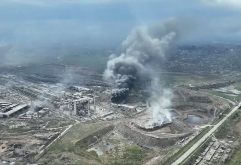 Smoke rises above Azovstal steelworks, in Mariupol, Ukraine, in this still image obtained from a recent drone video posted on social media. MARIUPOL CITY COUNCIL/via REUTERS