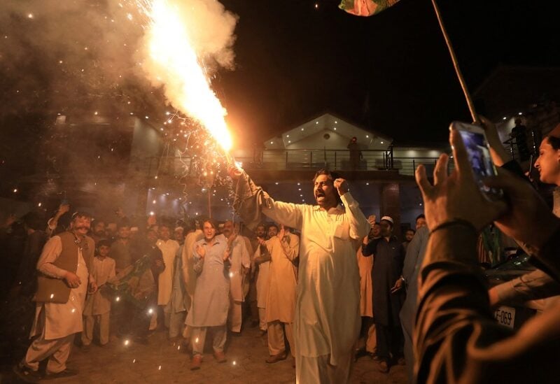 Supporters of the Pakistan Muslim League-Nawaz (PML-N) celebrate after Shehbaz Sharif was sworn in as the country's prime minister, in Peshawar, Pakistan April 11, 2022. REUTERS/Fayaz Aziz