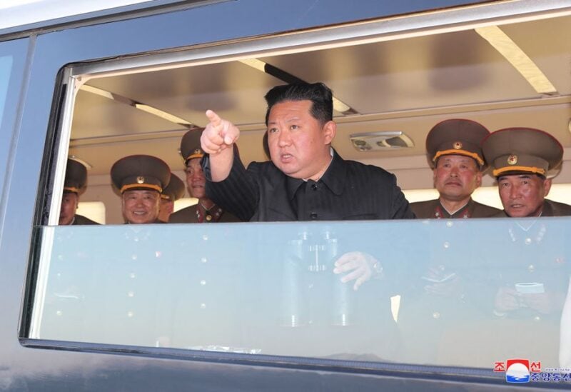 North Korean leader Kim Jong Un gestures as he watches the test-firing of a new-type tactical guided weapon according to state media, North Korea, in this undated photo released on April 16, 2022 by North Korea's Korean Central News Agency (KCNA). KCNA via REUTERS