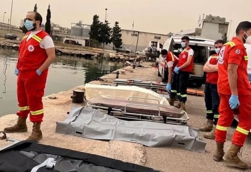 Red Cross members at port of Tripoli