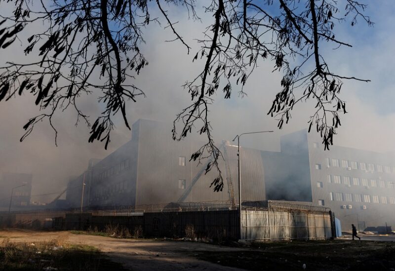 Smoke billows from a department store after it was hit by shelling in Kharkiv as Russia's attack on Ukraine continues, Ukraine, April 7 2022. REUTERS/Thomas Peter