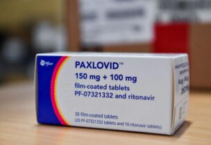 Coronavirus disease (COVID-19) treatment pill Paxlovid is seen in a box, at Misericordia hospital in Grosseto, Italy, February 8, 2022. REUTERS/Jennifer Lorenzini