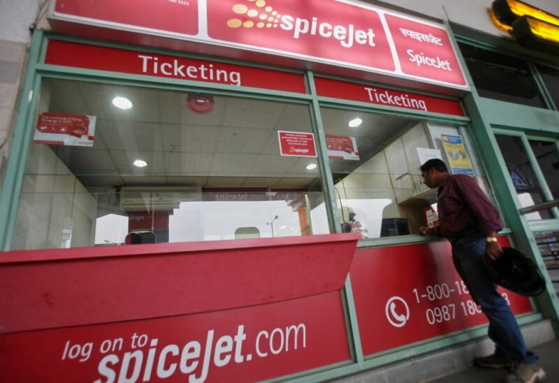 A passenger stands outside the SpiceJet ticket counter at the domestic airport on the outskirts of Agartala, capital of India's northeastern state of Tripura November 26, 2012. REUTERS/Jayanta Dey/File Photo