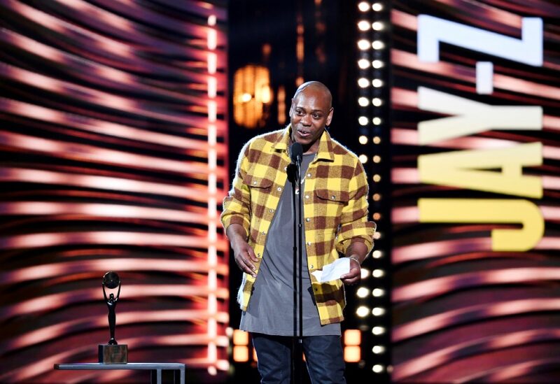 Dave Chappelle introduces Jay-Z during the Rock and Roll Hall of Fame induction ceremony in Cleveland, Ohio, U.S. October 30, 2021. REUTERS/Gaelen Morse/File Photo