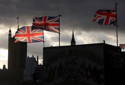 Union Jack flags fly in the wind in front of the Parliament at Westminster bridge, in London, Britain, January 29, 2022.