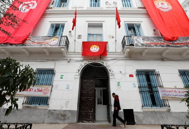 A man walks walk enter of the headquarters of the General Union of Tunisian Workers (UGTT) in Tunis, Tunisia, November 24,2018. REUTERS/Zoubeir Souissi