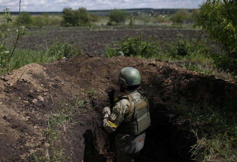 Ukrainian serviceman Shaba stays at a trench used as an observation point at a frontline area in Ruska Lozova, a village retaken by the Ukrainian forces, amid Russia's attack on Ukraine, in Kharkiv region, Ukraine, May 15, 2022. REUTERS/Ricardo Moraes