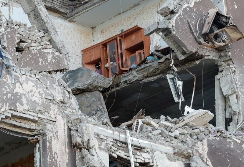 A view shows a block of flats destroyed during Ukraine-Russia conflict in the southern port city of Mariupol, Ukraine May 3, 2022. REUTERS/Alexander Ermochenko