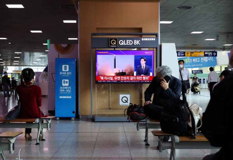 People watch a TV broadcasting a news report on North Korea's launch of three missiles including one thought to be an intercontinental ballistic missile (ICBM), in Seoul, South Korea, May 25, 2022. REUTERS/Kim Hong-Ji/File Photo