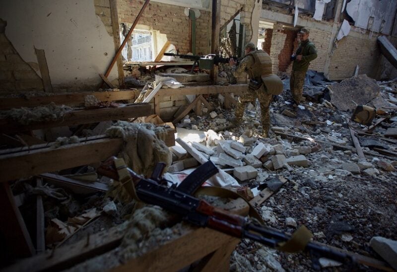 A Ukrainian serviceman sets up an anti-materiel rifle at a position, as Russia's attack on Ukraine continues, in the town of Marinka, in Donetsk region, Ukraine May 28, 2022. REUTERS/Anna Kudriavtseva