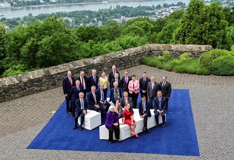Attendees pose for a family photo during the G7 Summit in Koenigswinter, near Bonn, Germany May 19, 2022. REUTERS/Benjamin Westhoff