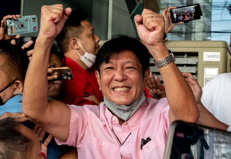 Philippine presidential candidate Ferdinand "Bongbong" Marcos Jr., son of late dictator Ferdinand Marcos, greets his supporters at his headquarters in Mandaluyong City, Metro Manila, Philippines, May 11, 2022. REUTERS/Lisa Marie David