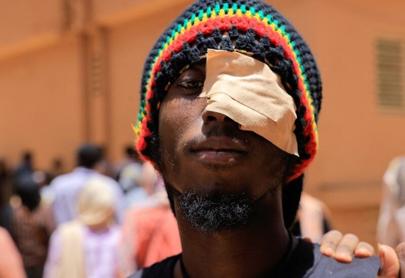 A wounded demonstrator looks on outside the court during the procedural session of the trial of the demonstrators accused of killing a police brigadier, in Khartoum, Sudan. May 29,2022. REUTERS/Mohamed Nureldin Abdallah