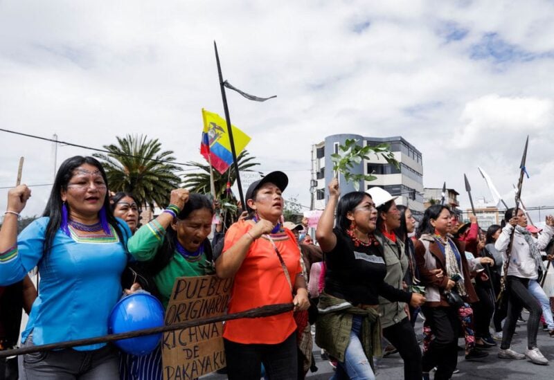 Women from different indigenous organizations, feminist groups and civil society march as they take part in a demonstration demanding lower fuel and food prices and an end to police violence after nearly two weeks of mass protest, in Quito, Ecuador June 25, 2022. REUTERS/Karen Toro