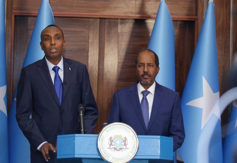 Somalia's President Hassan Sheikh Mohamud and newly appointed Prime Minister Hamza Abdi Barre address delegates at the Presidential Palace in Mogadishu, Somalia June 15, 2022. Presidential Press Service/Handout via REUTERS
