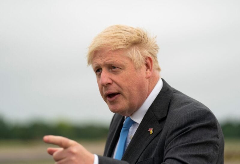 British Prime Minister Boris Johnson arrives at RAF Brize Norton, following a surprise visit to meet with Ukraine's President Volodymyr Zelenskiy in Kyiv, Ukraine, to offer a major training operation he believes that could "change the equation" against the Russian invasion, in Oxfordshire, Britain June 18, 2022. Joe Giddens/Pool via REUTERS