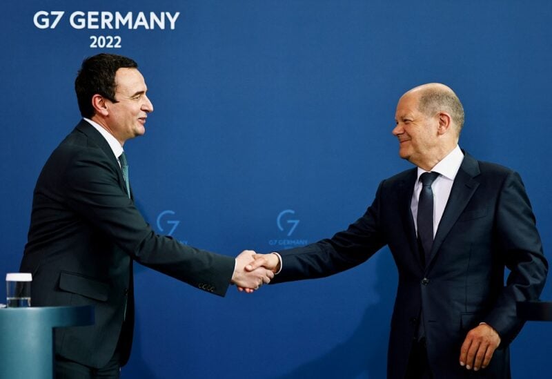 German Chancellor Olaf Scholz and Kosovo's Prime Minister Albin Kurti shake hands during a news conference in Berlin, Germany May 4, 2022. REUTERS/Hannibal Hanschke