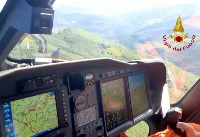 Fire brigade perform a search operation for a helicopter that vanished on Thursday with seven people aboard, including four Turkish businessmen, on the Apennines, Italy, June 10, 2022. Vigili del Fuoco/Handout via REUTERS ATTENTION EDITORS THIS IMAGE HAS BEEN SUPPLIED BY A THIRD PARTY. DO NOT OBSCURE LOGO.