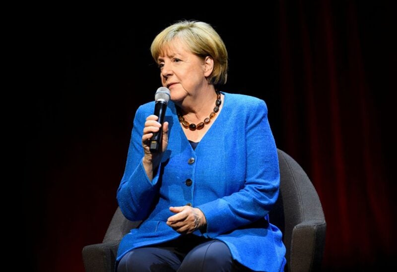 Former German Chancellor Angela Merkel speaks during a talk about "the challenging issues of our time" with author Alexander Osang (not pictured) at the Berliner Ensemble theatre in Berlin, Germany June 7, 2022. REUTERS/Annegret Hilse