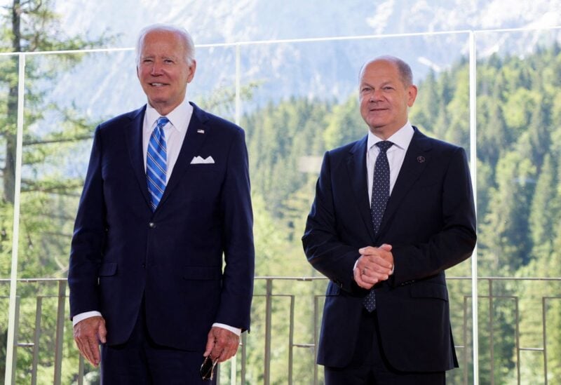 German Chancellor Olaf Scholz welcomes U.S. President Joe Biden ahead of their meeting on the day of G7 leaders summit at Bavaria's Schloss Elmau castle, near Garmisch-Partenkirchen, June 26, 2022. REUTERS/Leonhard Foeger/Pool
