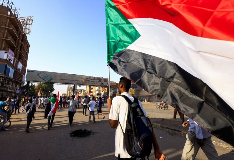 Protesters take part in a rally against military rule following a coup to commiserate the anniversary of a sit-in that culminated with Bashir's overthrow in Khartoum North, Sudan April 6, 2022. REUTERS/Mohamed Nureldin Abdallah