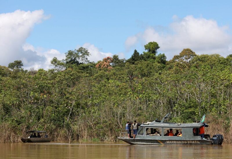 Brazilian Navy members conduct a search operation for British journalist Dom Phillips and indigenous expert Bruno Pereira, who went missing while reporting in a remote and lawless part of the Amazon rainforest, near the border with Peru, in Atalaia do Norte, Amazonas state, Brazil, June 14, 2022. REUTERS/Bruno Kelly