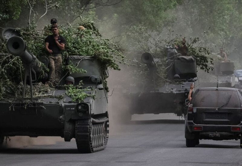 Ukrainian servicemen ride American 155 mm turreted self-propelled howitzers M109, amid Russia's attack on Ukraine, in Donetsk region, Ukraine June 13, 2022. REUTERS/Gleb Garanich