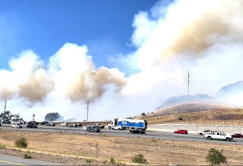 Smoke from the Redwood fire rises in Novato, California, U.S., June 27, 2022 in this still image obtained from a social media video. Nicholas Vides/The Oak Leaf/via REUTERS THIS IMAGE HAS BEEN SUPPLIED BY A THIRD PARTY. MANDATORY CREDIT. NO RESALES. NO ARCHIVES.
