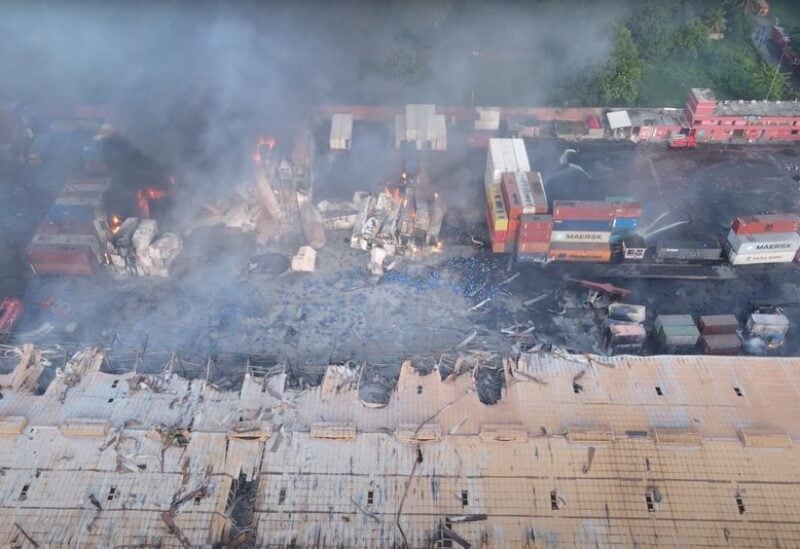 Drone footage shows smoke rising from the spot after a massive fire broke out in an inland container depot at Sitakunda, near the port city Chittagong, Bangladesh, June 5, 2022 in this still image obtained from a handout video. Al Mahmud BS/Handout via REUTERS
