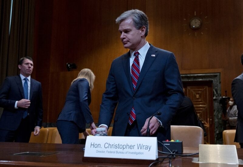 Federal Bureau of Investigation Director Christopher Wray prepares to testify in a hearing on the FY 2023 budget for the FBI held by the Commerce, Justice, Science, and Related Agencies Subcommittee on Capitol Hill in Washington, U.S., May 25, 2022. REUTERS/Leah Millis