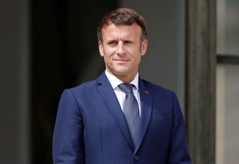 French President Emmanuel Macron welcomes a guest at the Elysee Palace in Paris, France, June 10, 2022. REUTERS/Benoit Tessier