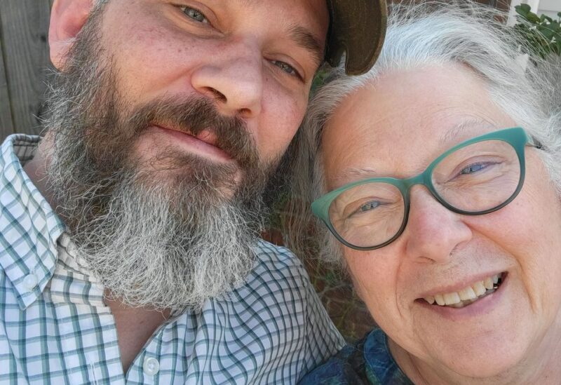 U.S. citizen Alexander Drueke and his mother, Lois Drueke, pose for a picture ahead of him leaving for Ukraine, in Tuscaloosa, Alabama, U.S