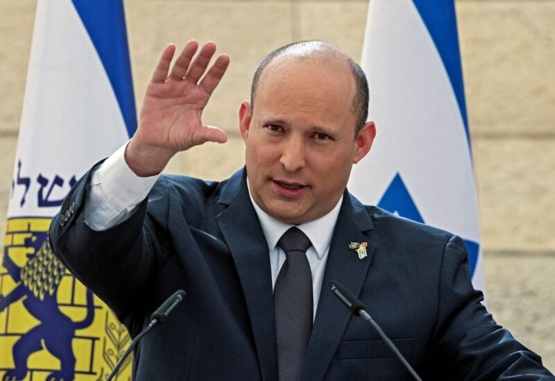 Israeli Prime Minister Naftali Bennett delivers a speech during the annual Yom Hazikaron Remembrance Day ceremony for fallen Israeli soldiers, in the Yad LaBanim Memorial in Jerusalem May 3, 2022. Menahem KAHANA /Pool via REUTERS
