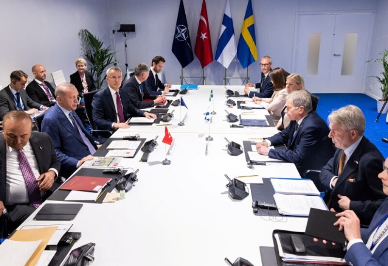 NATO Secretary General Jens Stoltenberg, Turkish President Tayyip Erdogan, Swedish Prime Minister Magdalena Andersson and Finnish President Sauli Niinisto attend a trilateral meeting between Turkey, Finland and Sweden on the day of a NATO summit in Madrid, Spain, June 28, 2022. NATO/Handout via REUTERS THIS IMAGE HAS BEEN SUPPLIED BY A THIRD PARTY. NO RESALES. NO ARCHIVES