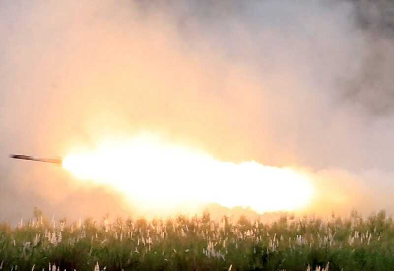 FILE PHOTO: U.S. military forces fire a High Mobility Artillery Rocket System (HIMARS) rocket during the annual Philippines-US live fire amphibious landing exercise (PHIBLEX) at Crow Valley in Capas, Tarlac province, north of Manila, Philippines October 10, 2016. REUTERS/Romeo Ranoco/File Photo