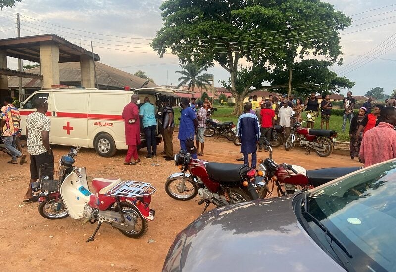Relatives of churchgoers who were attacked by gunmen during Sunday's church service gather as health workers attend to victims brought in by ambulance after the attack at St. Francis Catholic Church, in Owo, Nigeria June 5, 2022. REUTERS/Stringer NO RESALES. NO ARCHIVES