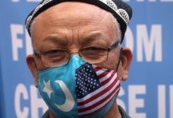 FILE PHOTO: Jamal Rehi takes part in a protest in front of the U.S. State Department to commemorate Uyghur Doppa Day and to urge the U.S. and the international community to take action against China's treatment of the Uyghur people in the East Turkestan (Xinjiang) region, in Washington, U.S. May 5, 2021. REUTERS/Leah Millis/File Photo