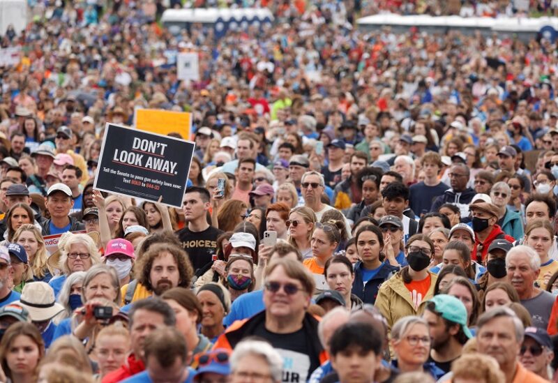 People participate in the March for Our Lives, one of a series of nationwide protests against gun violence, on the National Mall in Washington, DC, U.S., June 11, 2022. REUTERS/Jonathan Ernst TPX IMAGES OF THE DAY