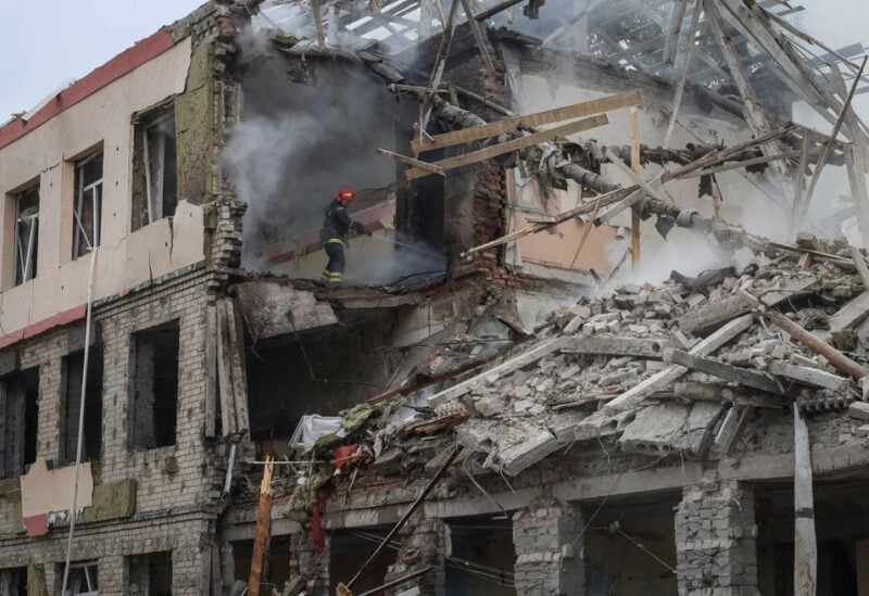A rescuer works at a school building damaged by a Russian military strike, amid Russia's invasion on Ukraine, in Kramatorsk, in Donetsk region, Ukraine July 21, 2022. REUTERS/Gleb Garanich/File Photo