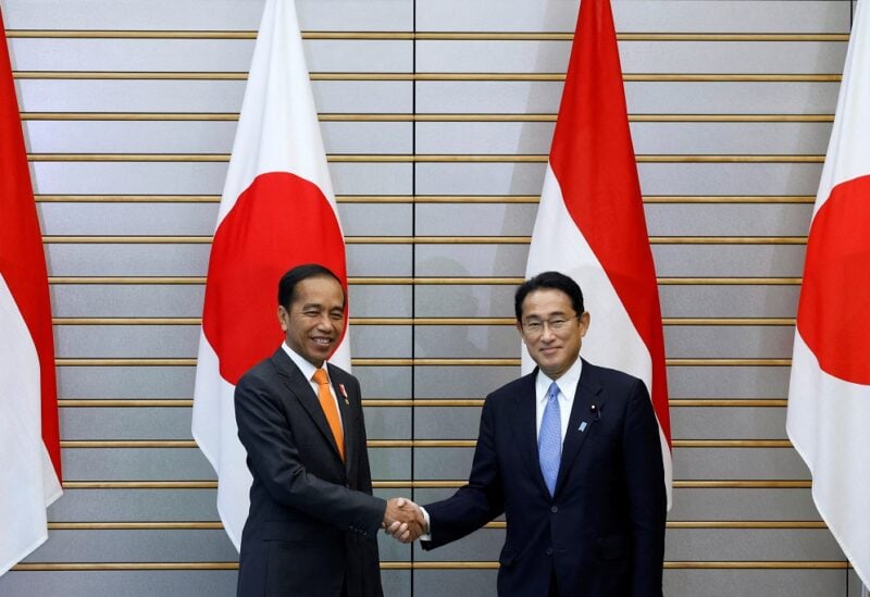 Joko Widodo, Indonesia's President, and Fumio Kishida, Japan's Prime Minister, shake hands during a summit meeting at the prime minister's official residence in Tokyo, Japan, July 27, 2022. Kiyoshi Ota/Pool via REUTERS
