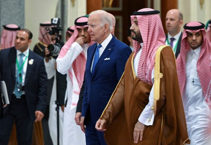 U.S. President Joe Biden and Saudi Crown Prince Mohammed bin Salman arrive for the family photo during the Jeddah Security and Development Summit (GCC+3) at a hotel in Jeddah, Saudi Arabia July 16, 2022. Mandel Ngan/Pool via REUTERS