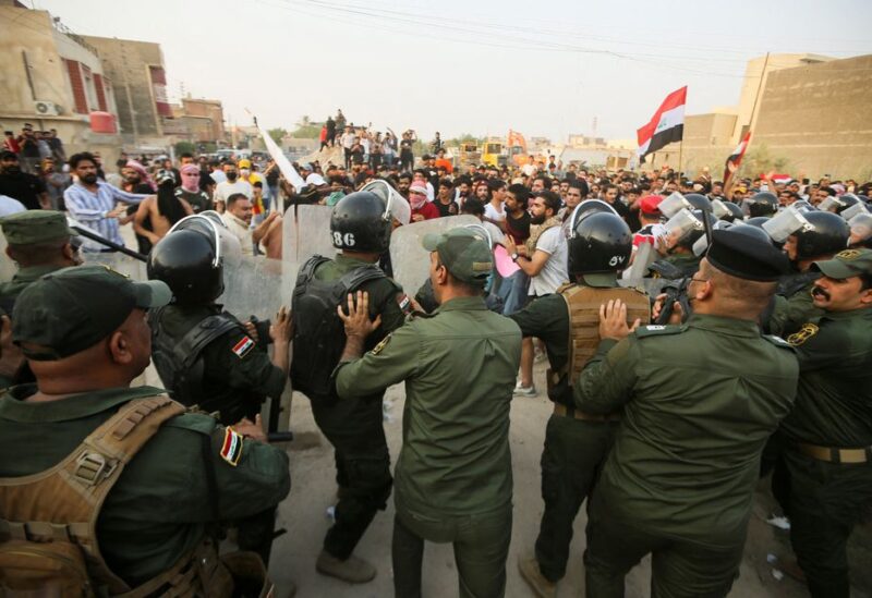 Police clash with demonstrators gathered in front of the Turkish consulate as they protest against a Turkish attack on a mountain resort in Iraq's northern province of Dohuk, in Basra , Iraq July 21, 2022. REUTERS/Essam Al- sudani