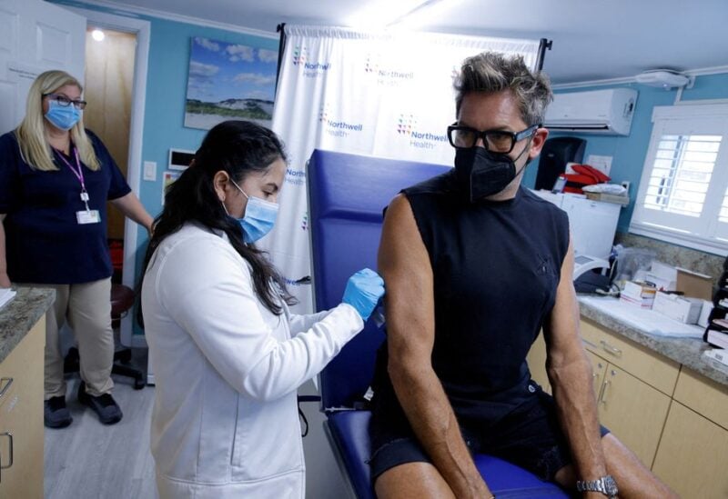 Tareco Timothy receives a monkeypox vaccination at the Northwell Health Immediate Care Center at Fire Island-Cherry Grove, in New York, U.S., July 15, 2022. REUTERS/Eduardo Munoz/