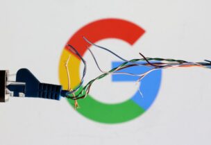 Broken Ethernet cable is seen in front of Google logo in this illustration taken March 11, 2022. REUTERS/Dado Ruvic/Illustration