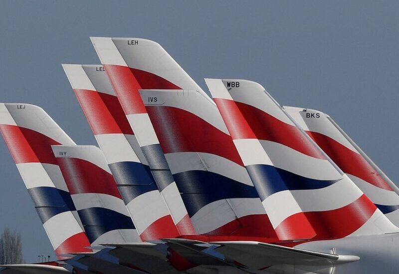Tail Fins of British Airways planes are seen parked at Heathrow airport as the spread of the coronavirus disease (COVID-19) continues, London, Britain, March 31, 2020. REUTERS/Toby Melville/