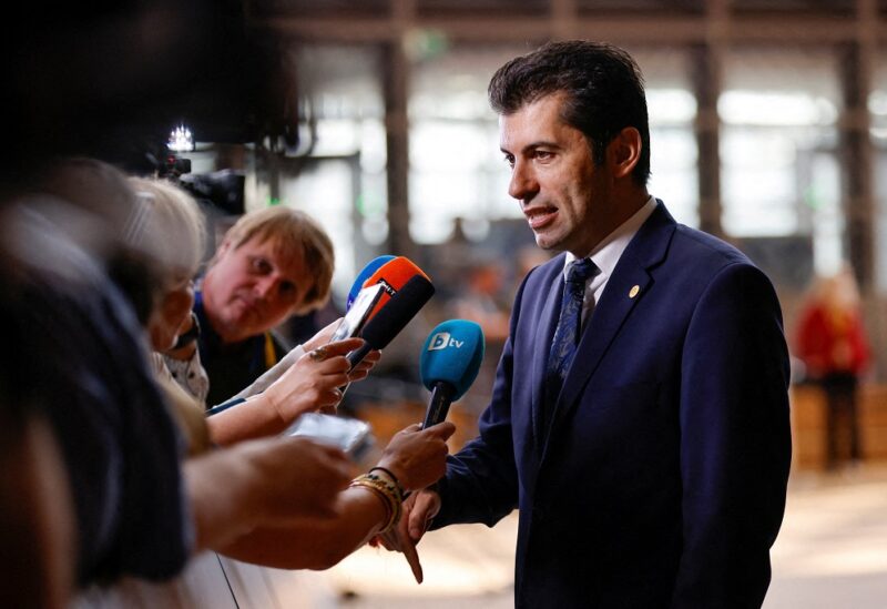 Bulgarian Prime Minister Kiril Petkov speaks to the members of the media as he arrives for a meeting of Western Balkans countries leaders with EU leaders in Brussels, Belgium June 23, 2022. REUTERS/Johanna Geron